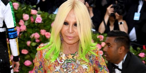 Versace apologises for T